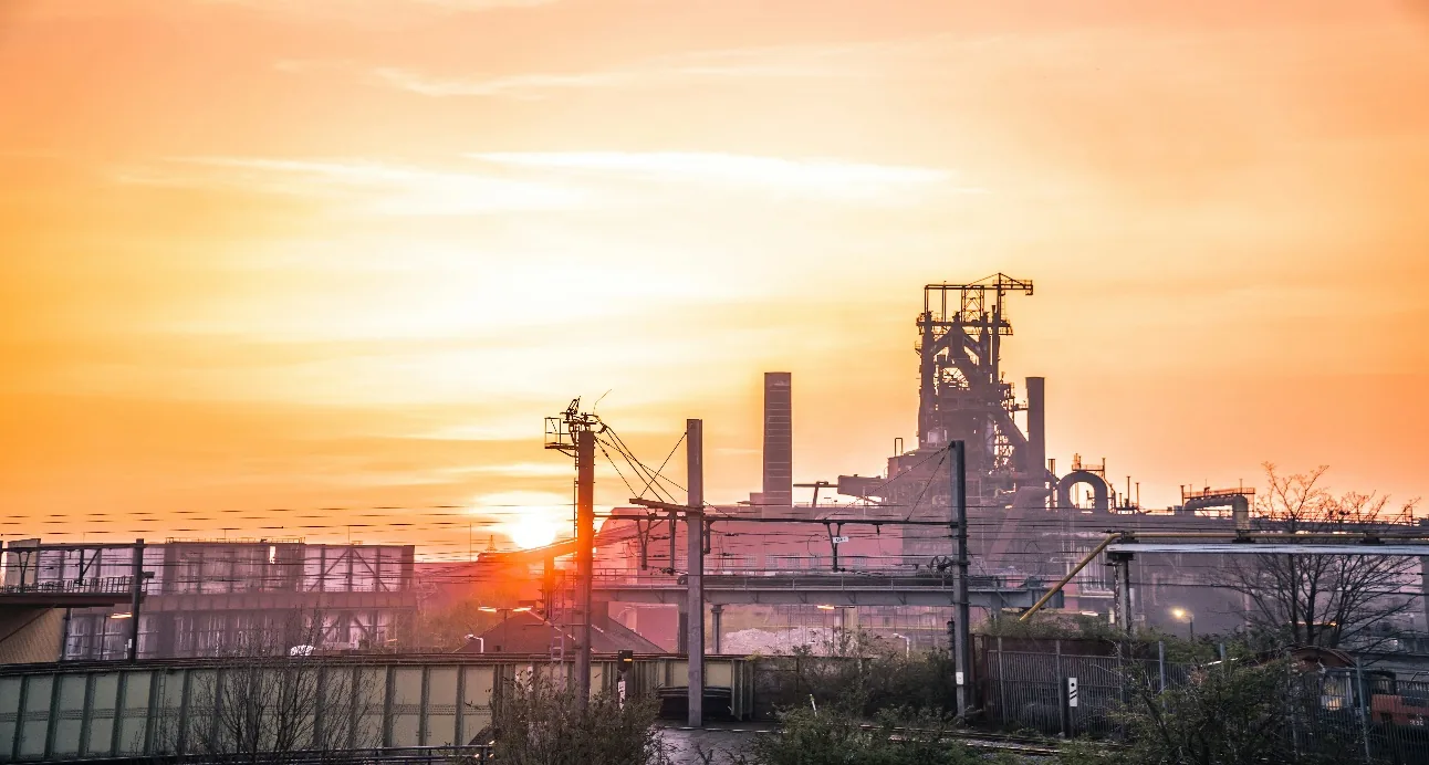 Industrial facilities at sunset